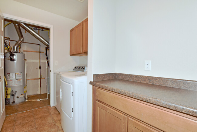 Utility room located off laundry area - 6349 Orchard Park Dr