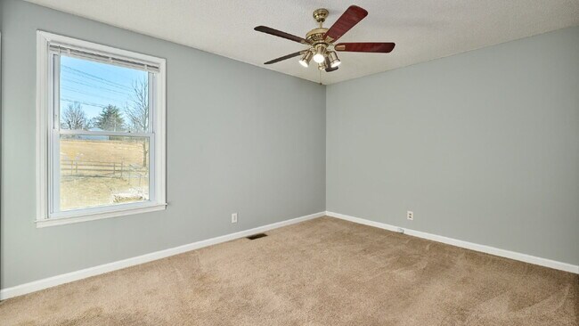 Building Photo - Now Ready : 4BR, 1 1/2BA home with fenced in back yard and storage building.