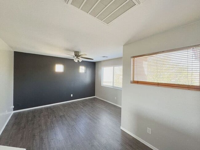 Building Photo - 4BR / 2.5BA Home with Expansive Lot – 2-Car Garage, Community Pools & Golf