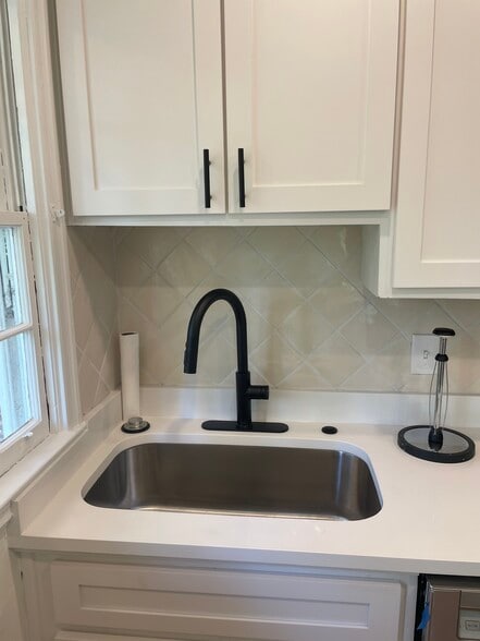 New sink and faucet with garbage disposal - 239 Kinsey Ct NE