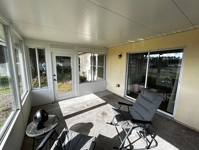 Building Photo - Newer Build 3/2 with Fenced in yard minute...