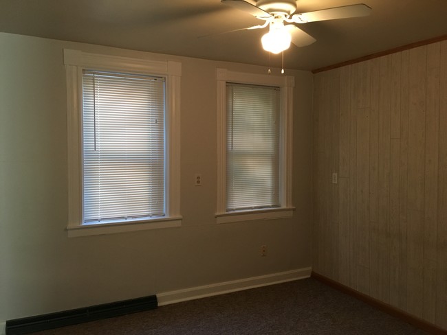 Bedroom with walk-in closet - 103 E 8th St