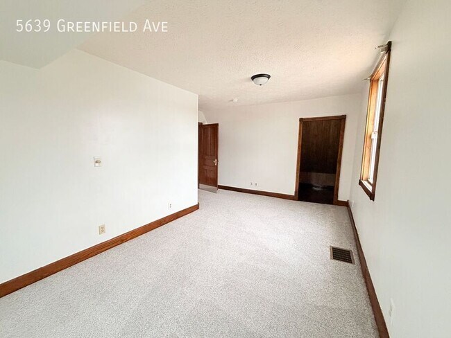 Building Photo - 5639 Greenfield Ave