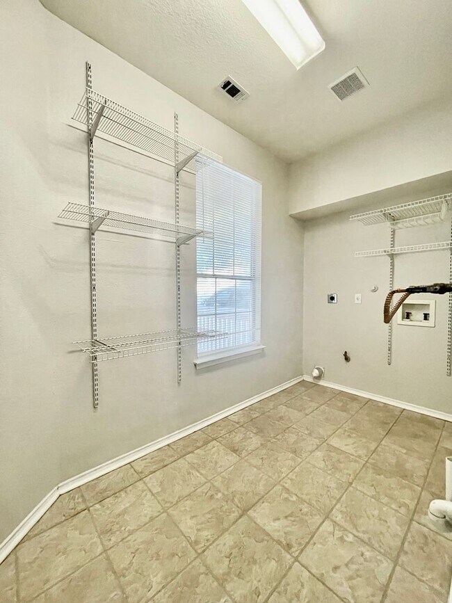Building Photo - Spacious Home with Multiple Outdoor Living...
