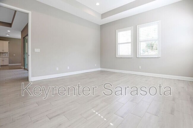 Building Photo - 6133 Lungo Lago Dr