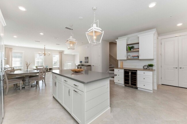 Building Photo - Introducing a captivating 3-story townhome...