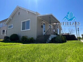 Building Photo - "Charming 3-Bed Home with Partially Finished Basement & Gleaming Hardwood Floors in Hammond - 226...