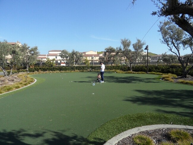 Building Photo - 4BR 3BA two-story condo with 2 Car Attached Garage