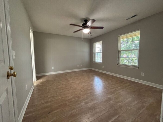 Building Photo - You will LOVE the fenced yard!