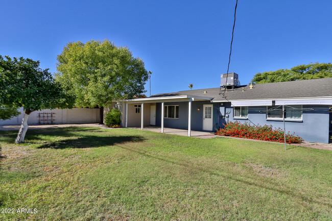 Building Photo - 8419 E Sheridan St
