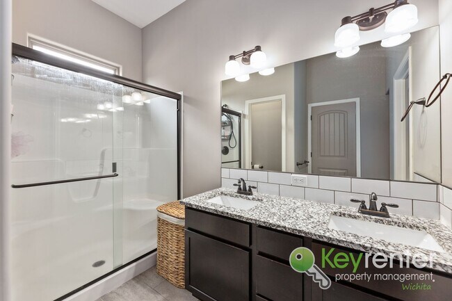 Building Photo - Spacious 4-Bedroom Home with Finished Basement & 3-Car Garage – Derby, KS