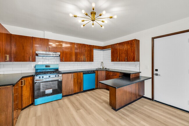 Building Photo - 5611 S Trenton Ave