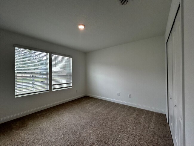 Building Photo - AMAZING POND VIEW! This is a great price o...