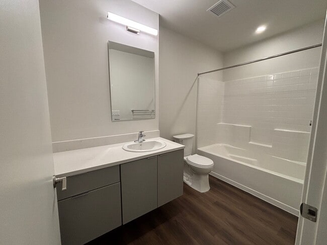 Building Photo - Bright South Corner Home with Park Views –...