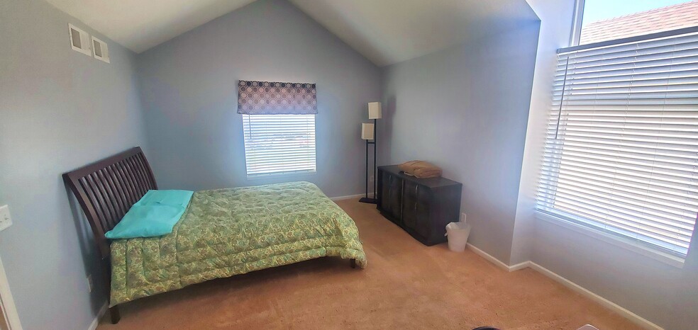 Master suite with private bathroom and walk-in closet. - 11023 Askew Ave