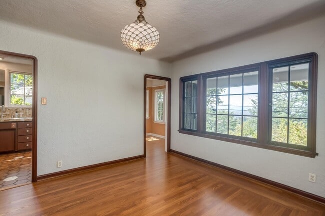 Building Photo - MUST SEE! Unique and Charming 4 bedroom 2.5 Bath Home w/Stunning Views!