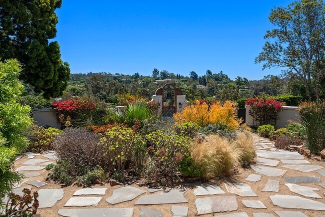 Building Photo - This Beautiful Hacienda Style Home combine...