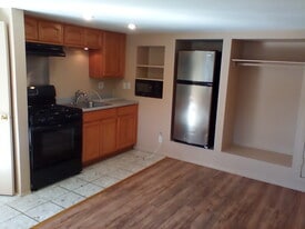 Kitchen area with appliances. - 6200 St Albans St