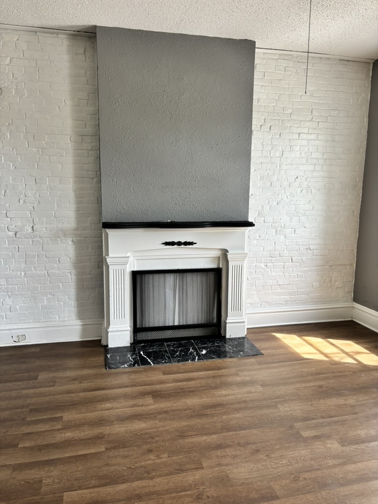 Beautiful fireplace to center the room - 2621 Arsenal St