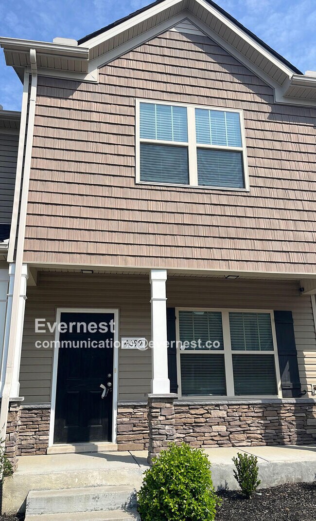 Primary Photo - Charming 2BR Townhouse with Modern Comfort...