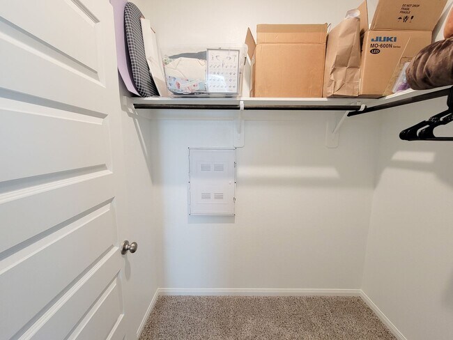 Building Photo - A true gem on a quiet corner lot, this spacious and sun-filled home is tucked away from street no...