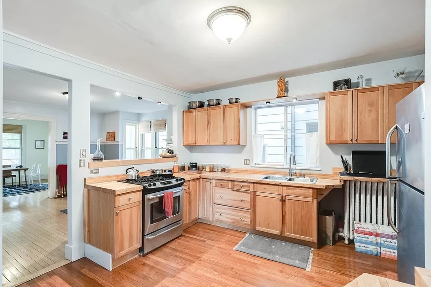 Kitchen. Countertops are reclaimed wood from Bryant Lake Bowl. - 3032 grand ave