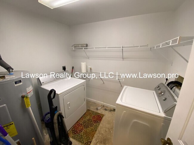 Building Photo - Well Maintained Three Bedroom with Fenced Yard and Shed
