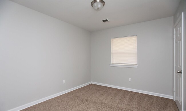 Building Photo - 7304 Dahlia Dr