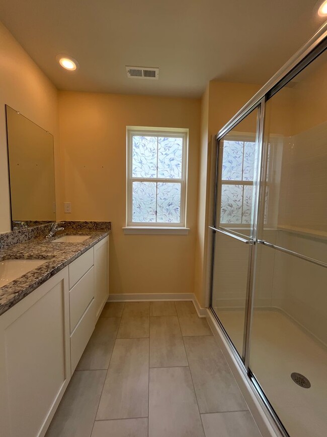 Building Photo - Move-in-ready Brookside Court townhome off...