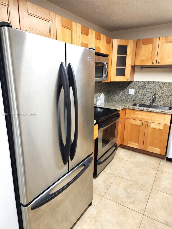 Building Photo - 22615 SW 66th Ave