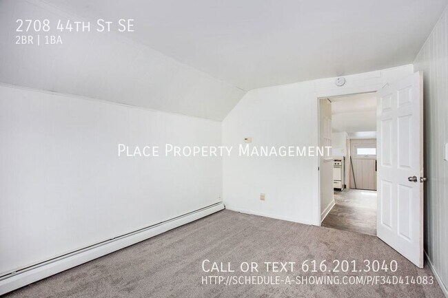 Building Photo - 2708 44th St Se - 2 Bed/1 Bath Upper Apart...