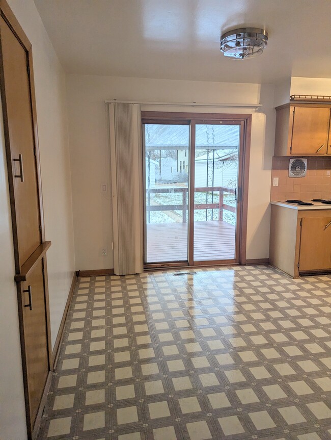 More storage with this in-wall pantry. A subtle pocket door guarantees a serene dining experience. - 910 Maple St