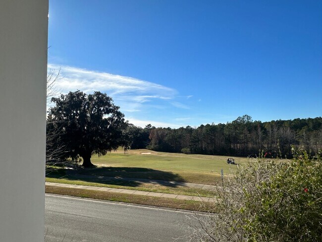 Building Photo - 2 Story Townhome ON SOUTHWOOD'S GOLF COURSE!