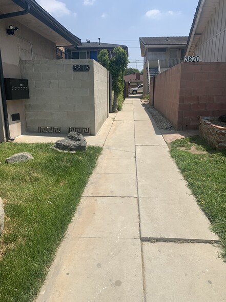 Walk way to your unit - 3814 S. Bronson Ave