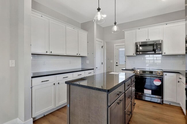 Building Photo - Modern 3-Bed Ranch in Maize – Zero-Entry L...