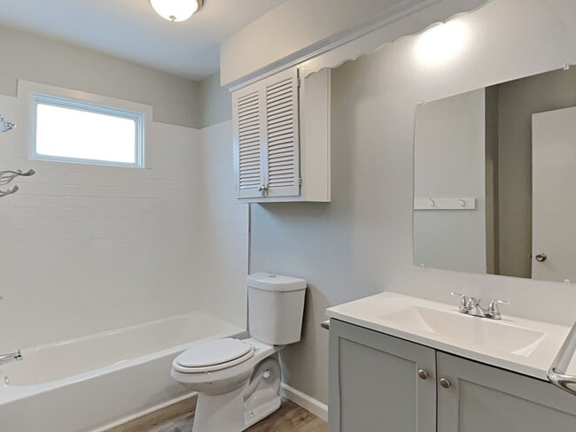 Building Photo - Spacious 4BR Home with Finished Basement, Fireplace & Unique Layout