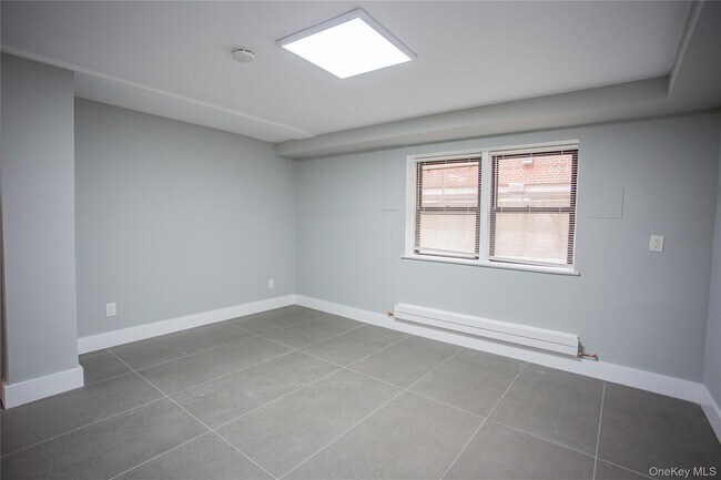 Building Photo - 470 E Broadway