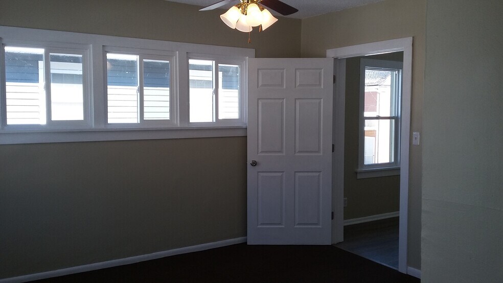 Main floor bedroom - space and lots of light! - 1518 Irving Ave N