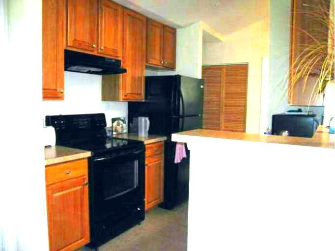Kitchen has lots of cabinets & counter space! - 9902 Boysenberry Way