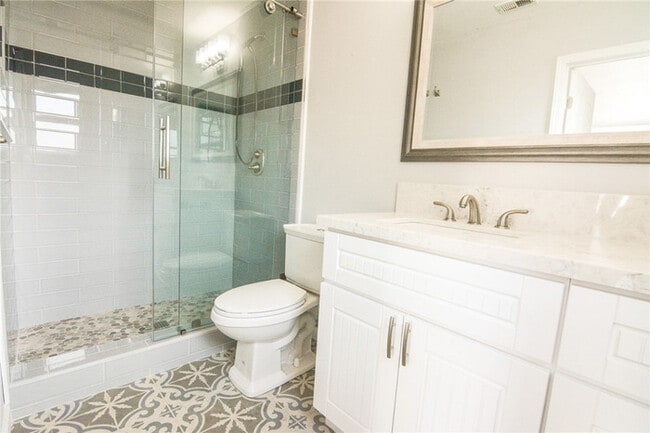 Building Photo - Updated Coastal Home with Studio Unit & Solar in Ocean Beach