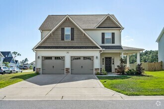 Building Photo - Fenced Yard 4 Bedroom w 3rd Floor Bonus Room!