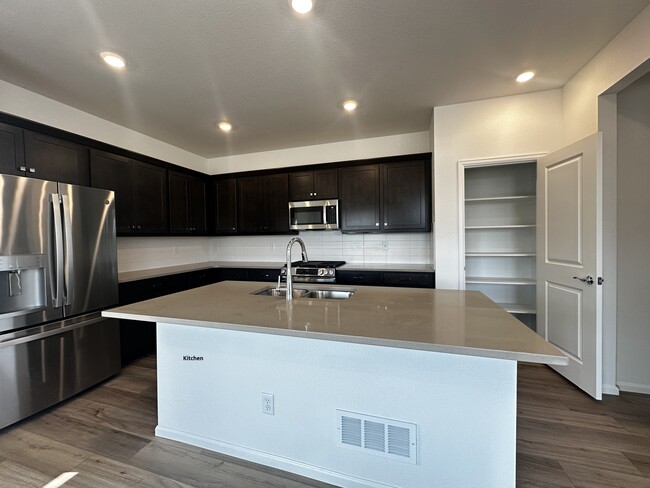 Building Photo - 21154 E 63rd Dr