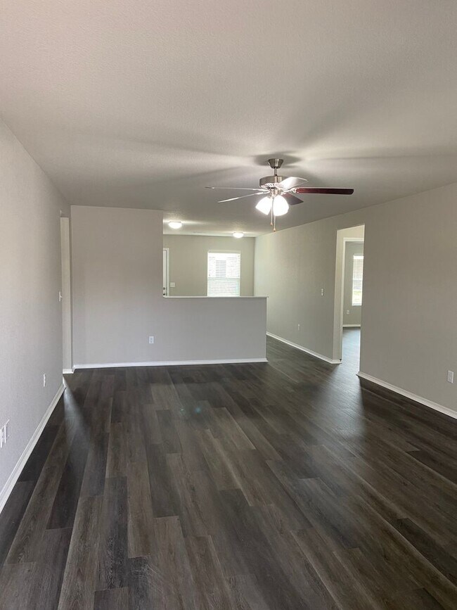 Building Photo - NOW AVAILABLE — Spacious Living in This 4-Bedroom | 2-Bath Conrad Court Home