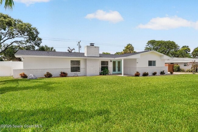 Building Photo - Welcome to this beautifully remodeled 4-bedroom, 3-bath home in the heart of Indialantic Beach!