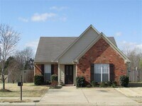 Building Photo - Olive Branch - 3 Bedroom, 2 Full bath Split Plan with Patio and Wood Privacy Fenced in Yard - Ove...