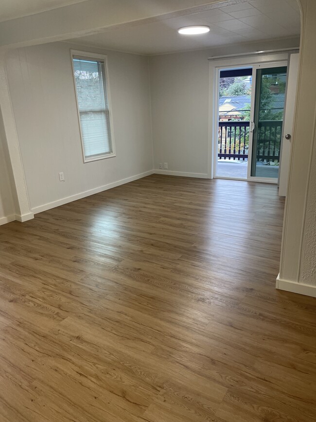 Living room/dining room looking out onto porch - 1111 NW 58th St