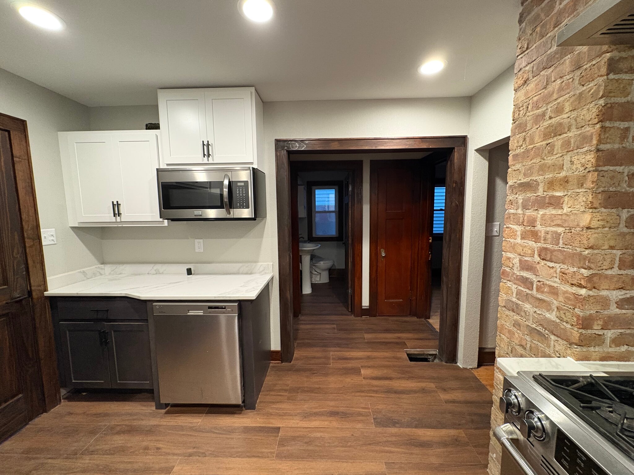 Kitchen into hallway to bedrooms and bathroom - 861 S 75th St