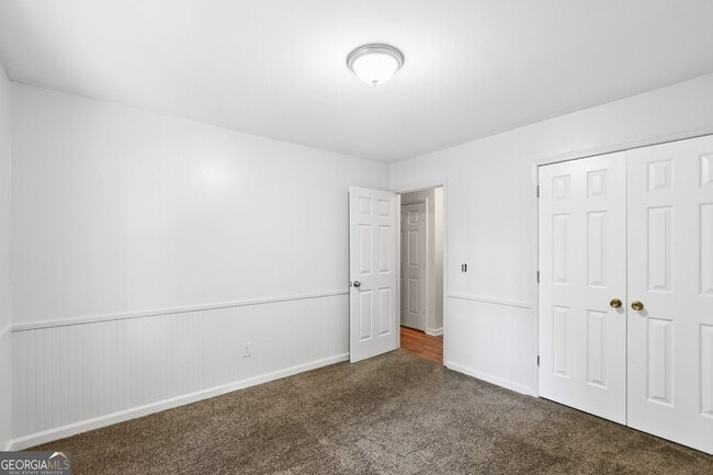 Building Photo - 5659 Whispering Pines Rd