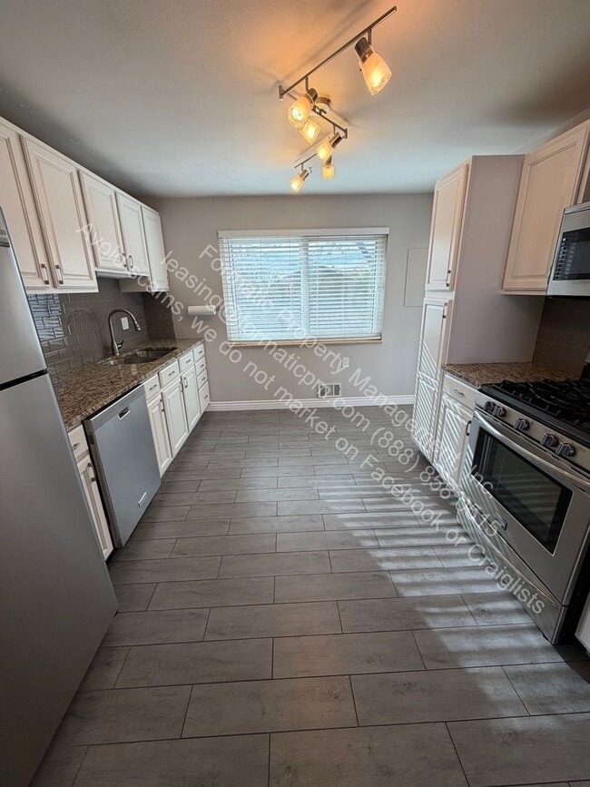 Building Photo - 6656 W 61st Ave