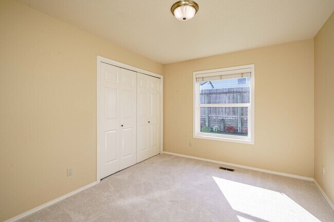 Building Photo - Beautifully Landscaped 1/4 acre with Well Maintained 4 bedroom 2 Bath Home with 3 Car Garage